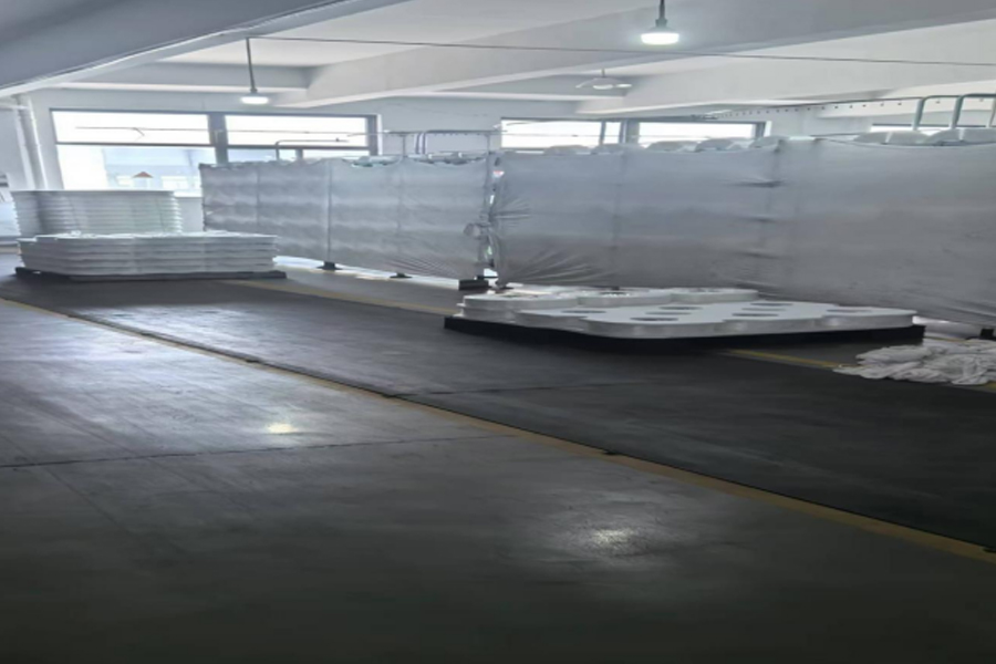 Zone de placement de matières premières pour la production de tissus gris